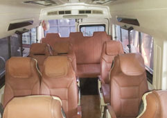 9 seater tempo traveller hire - sharma travel agents